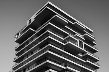 pexels photo 157811 157811 A striking black and white photo of a modern high-rise building with unique geometric designs.
